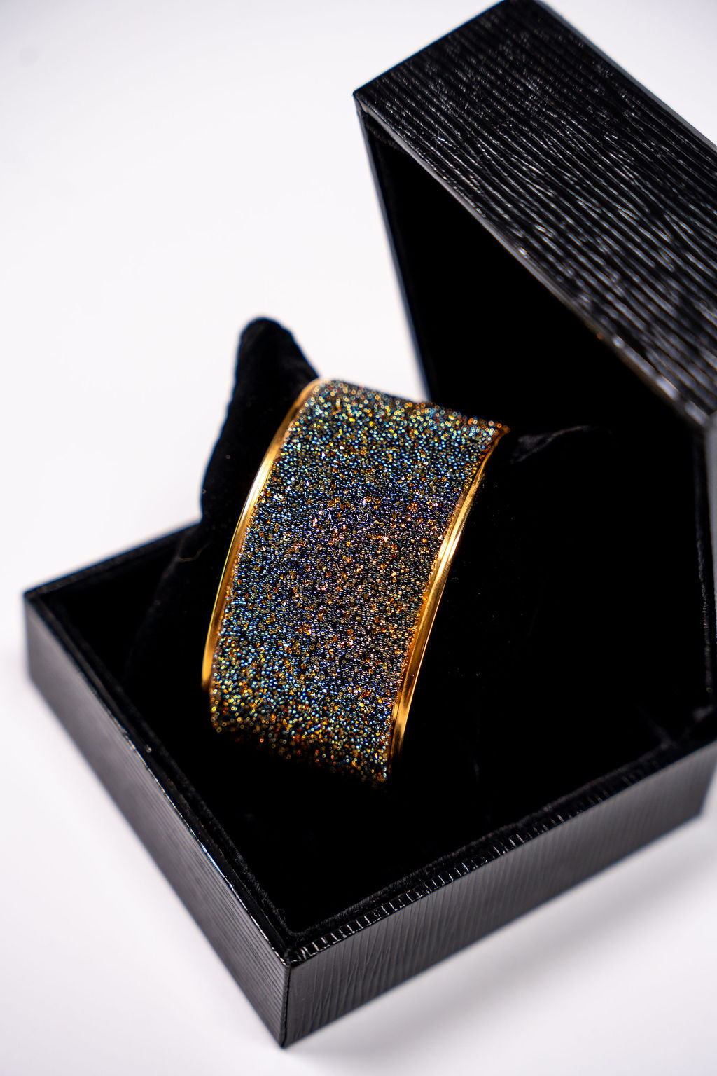 Manchette décorée Cristal Caviar noir mordoré